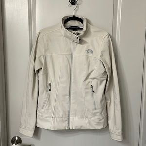 Womens cream colored rain jacket. North Face size medium.